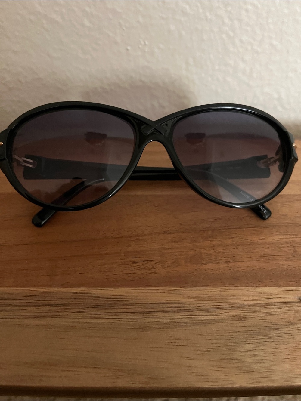 Nina Ricci Black Frame Sunglasses with Gradient Smoke Lenses